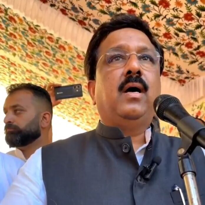 Congress leaders engaging with attendees at Voter Adhikar Samelan in Uri