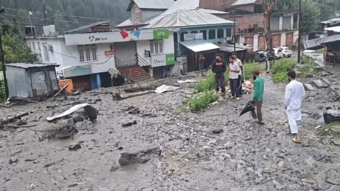 Damaged houses after cloudburst in Kishtwar's Chatroo area